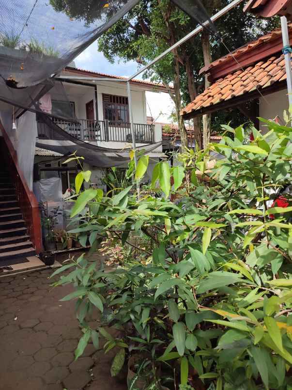 rumah dan 7 kontrakan serta 5 kos kosan