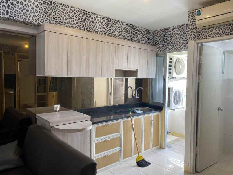 apartemen educity 2br semi furnished tower yale