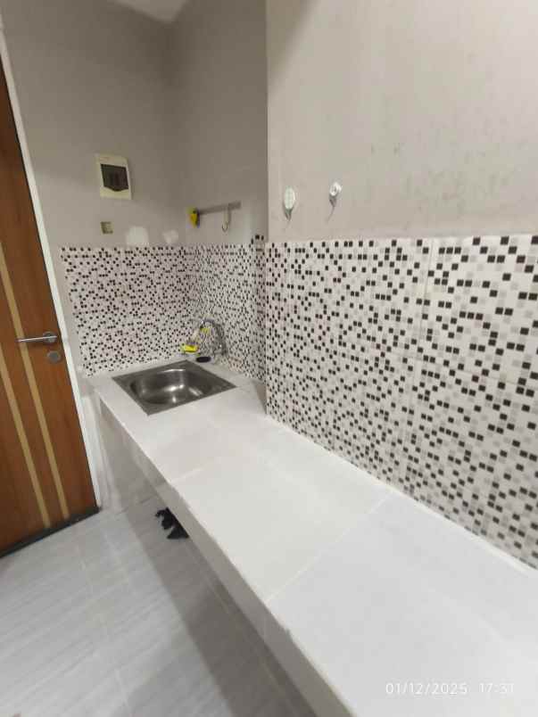 apartemen puncak dharmahusada tower b type studio