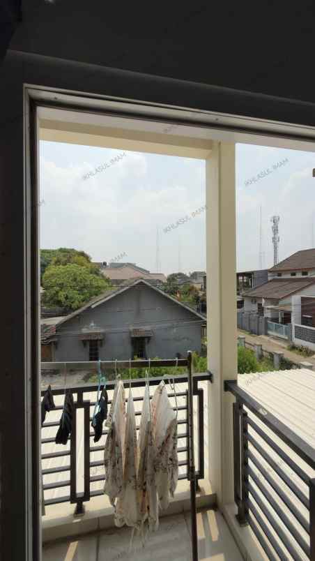 dijual rumah karang tengah
