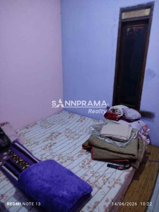 dijual rumah kln raya pancoran mas