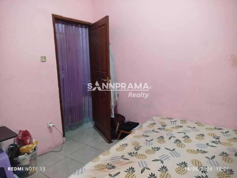 dijual rumah kln raya pancoran mas