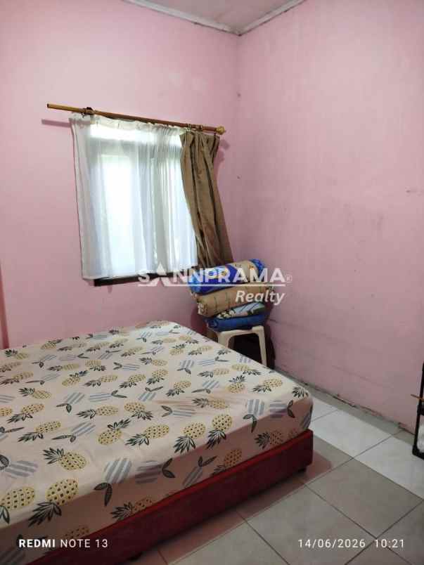 dijual rumah kln raya pancoran mas