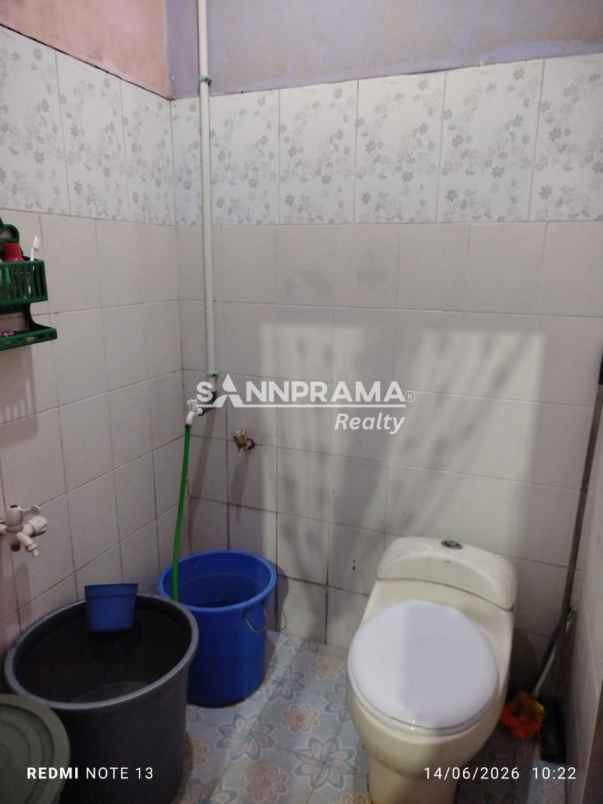 dijual rumah kln raya pancoran mas