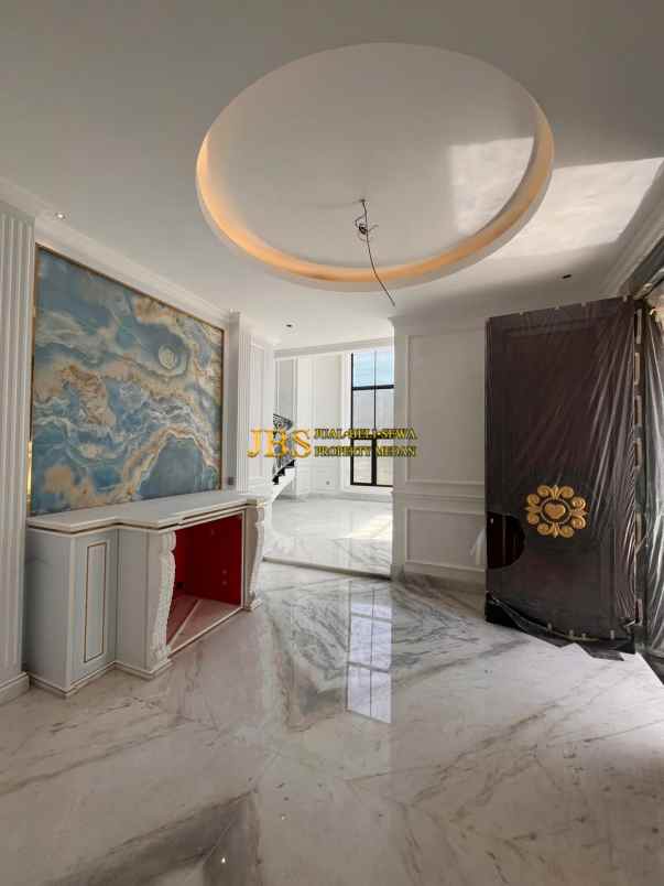 dijual rumah komplek graha metropolitan