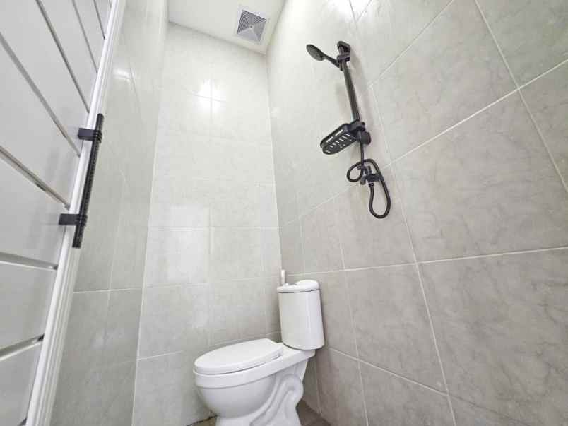 dijual rumah perumahan taman harapan