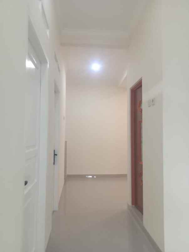 dijual rumah taman harapan baru