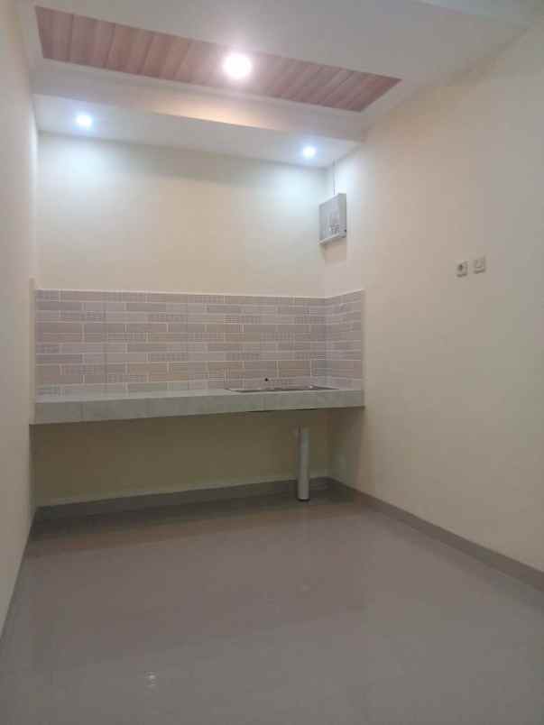 dijual rumah taman harapan baru