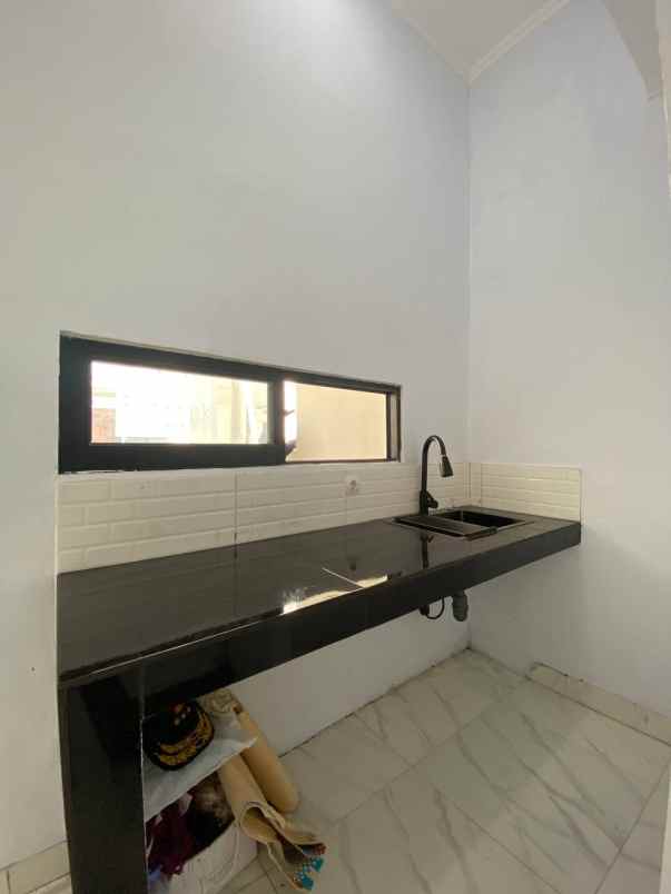 rumah dp 0 siap huni 2 lantai dekat stasiun