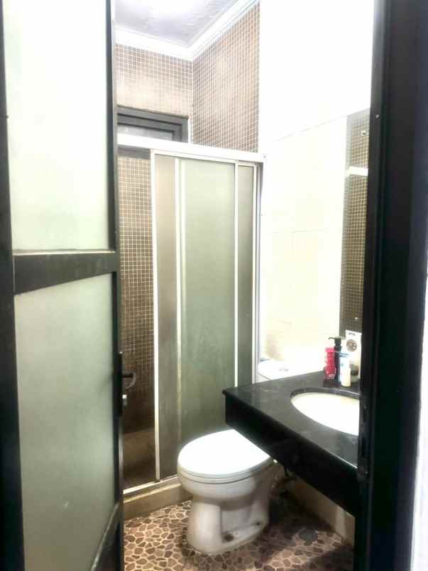 rumah hook elite premium di raffles hills cibubur