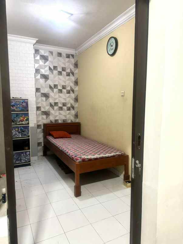 rumah hook elite premium di raffles hills cibubur