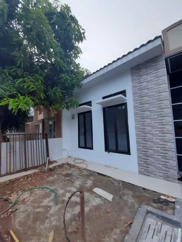 rumah jl raya harvest city