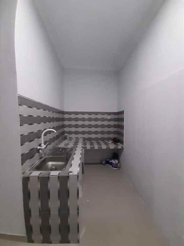 rumah jl raya harvest city