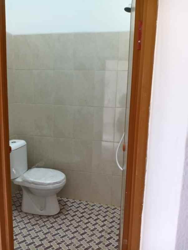 rumah jl raya sawangan rangkpan