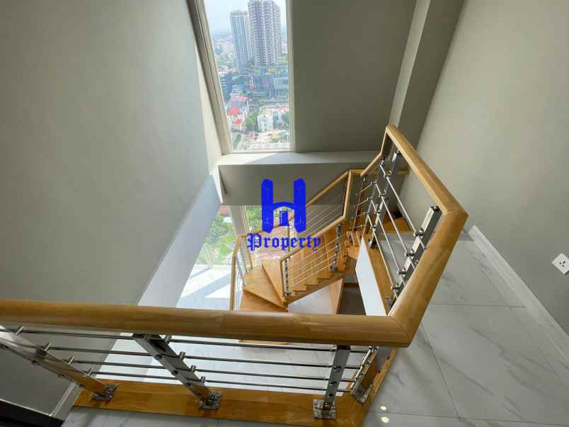 turun harga jual apartemen grand jati junction medan