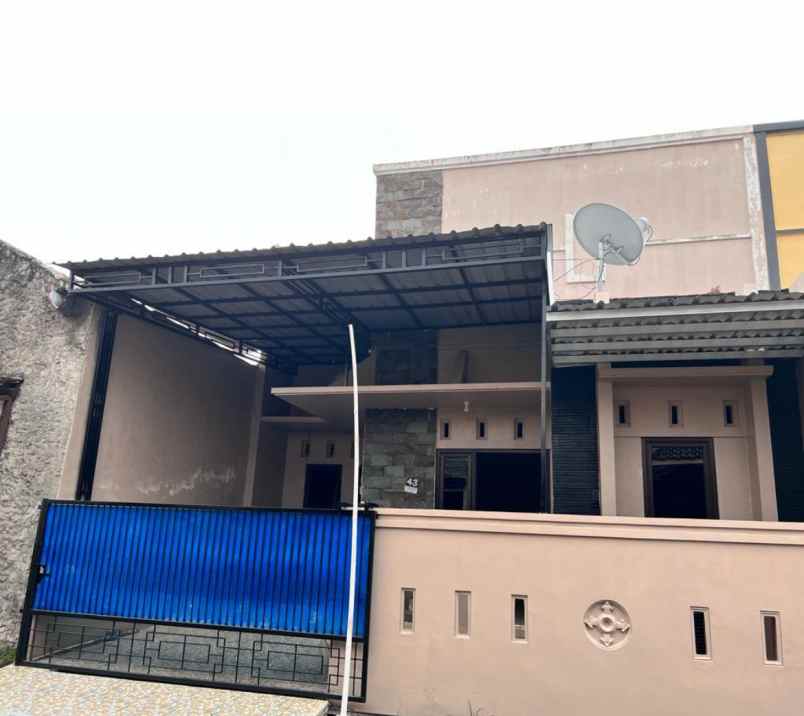 dijual rumah jalan merpati barat raya