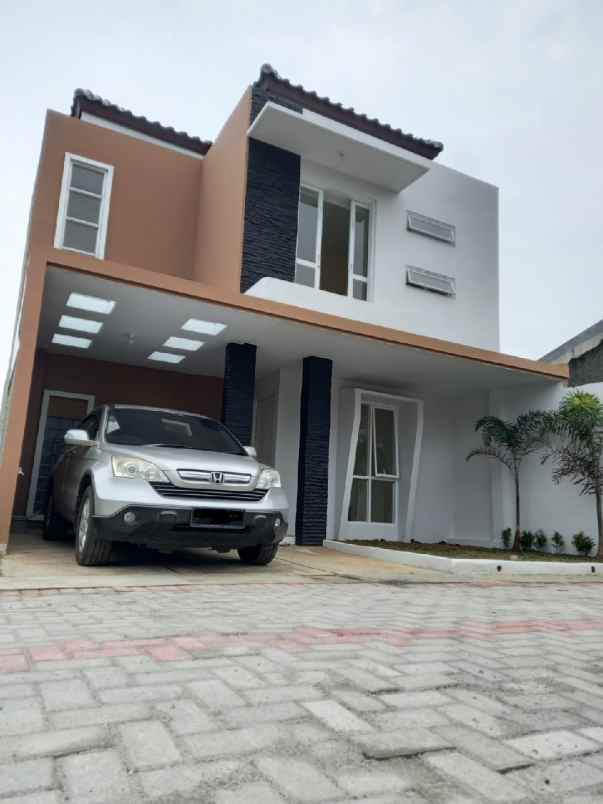 dijual rumah jl h milun