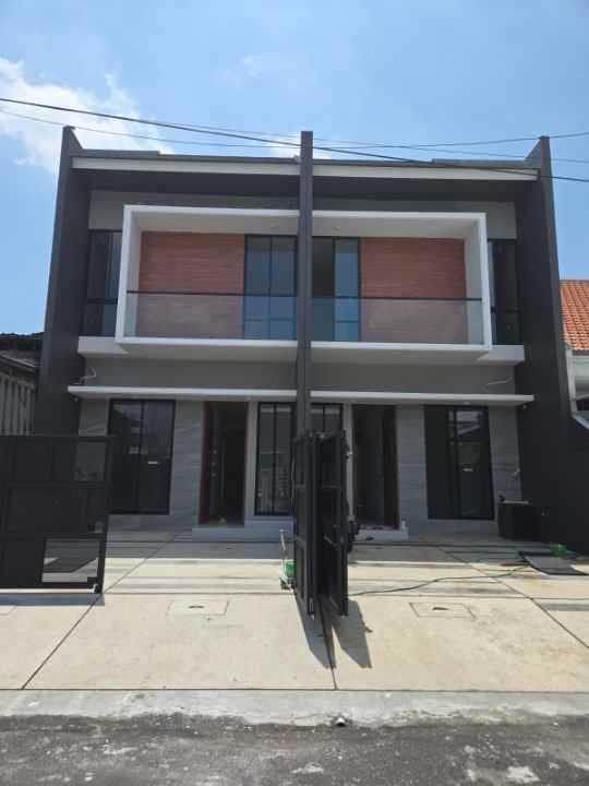 dijual rumah penjaringan asri
