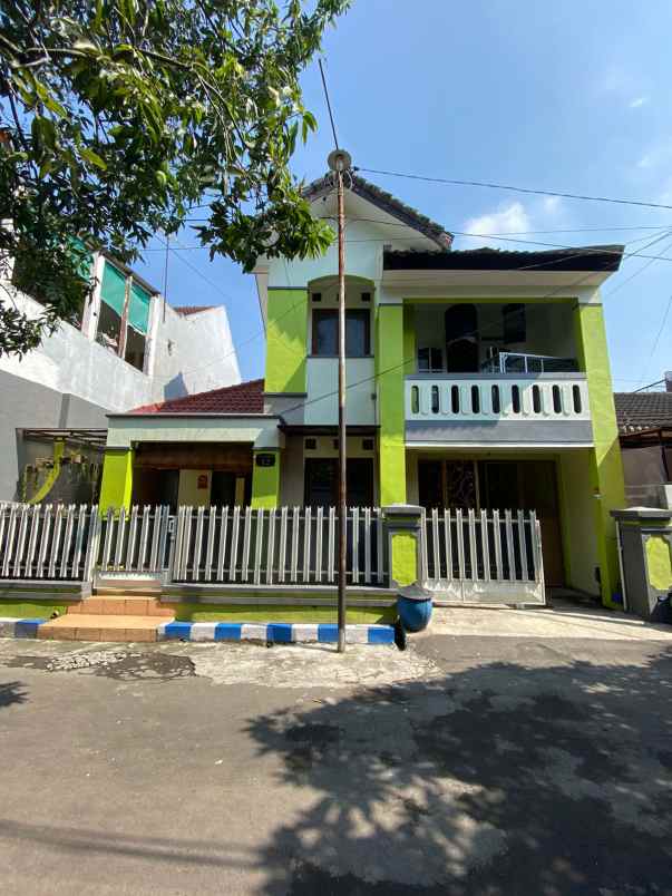 rumah modern 2 lantai siap huni di sulfat