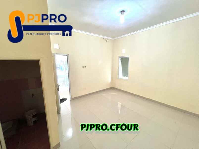 dijual rumah cluster duta bumi 1