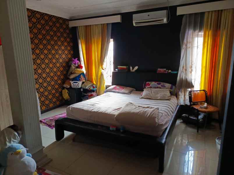 dijual rumah cluster taman pesona