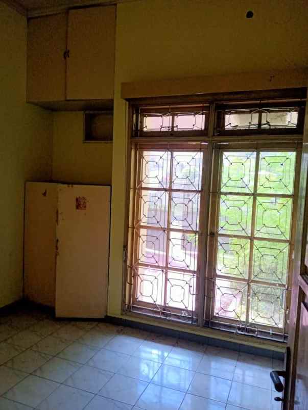 dijual rumah dharmahusada indah