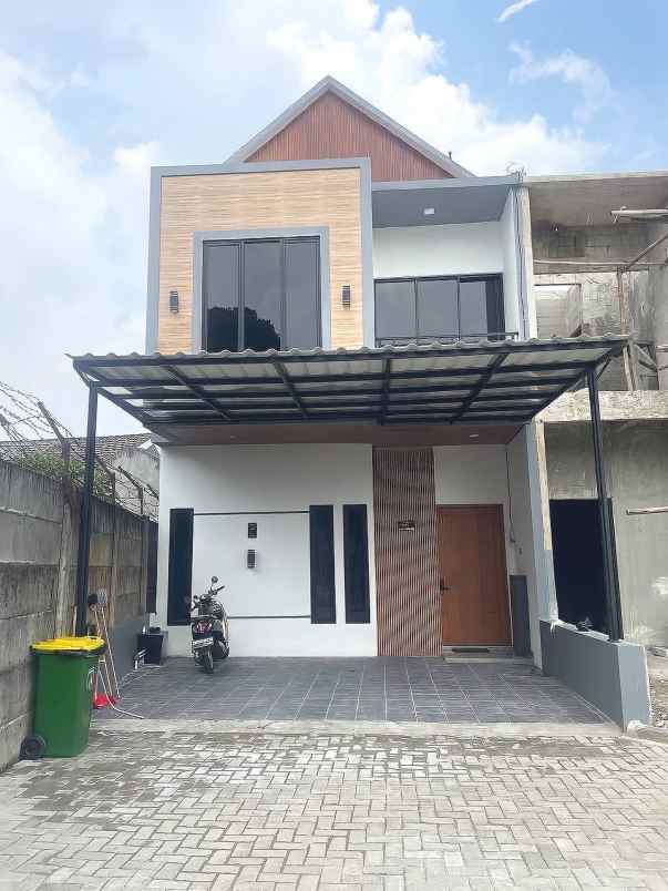 dijual rumah jalan raya parigi
