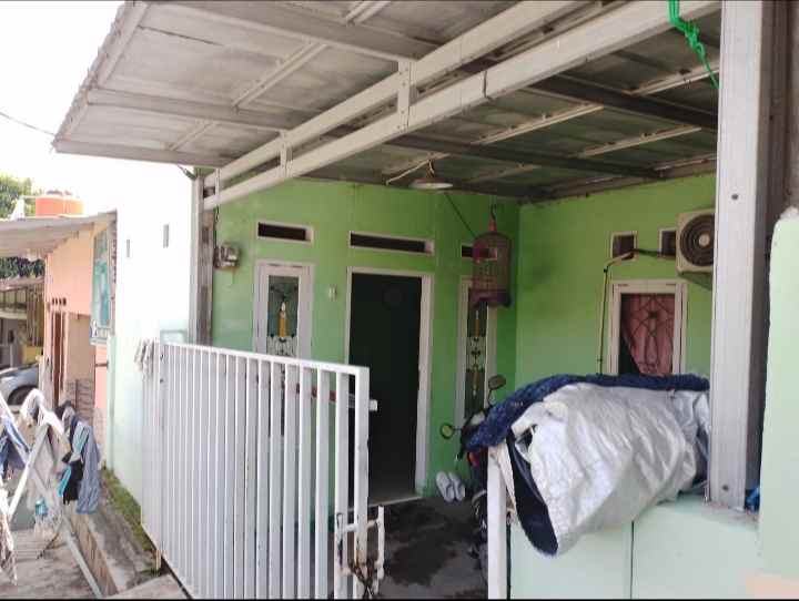 dijual rumah jalan taman kopassus