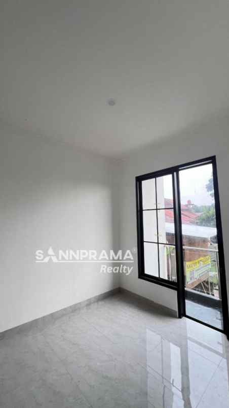 dijual rumah jln raya tapos depok