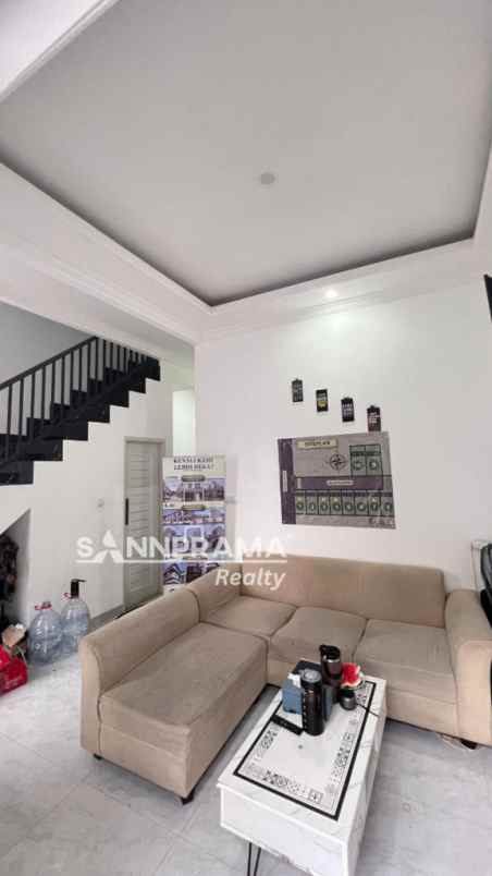 dijual rumah jln raya tapos depok