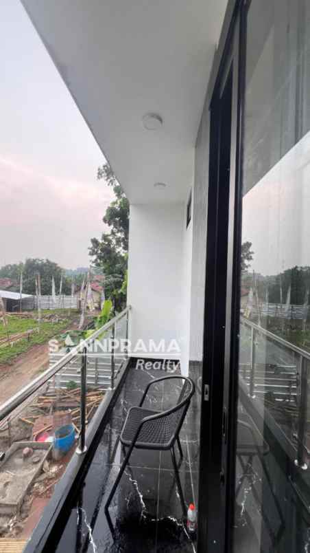 dijual rumah jln raya tapos depok
