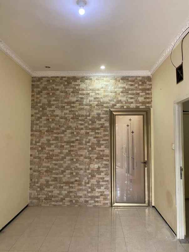 dijual rumah wiguna