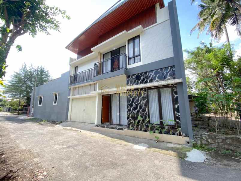 rumah 2 lantai kontemporer siap huni di ngaglik sleman