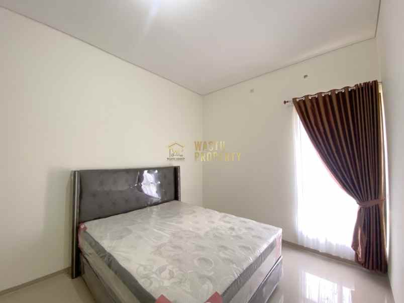 rumah 2 lantai kontemporer siap huni di ngaglik sleman