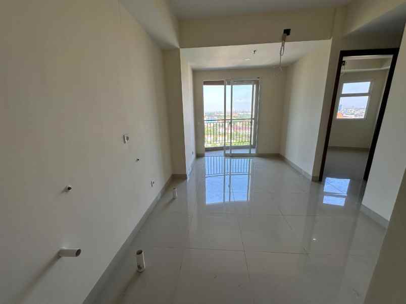 dijual apartemen grand dharmahusada lagoon