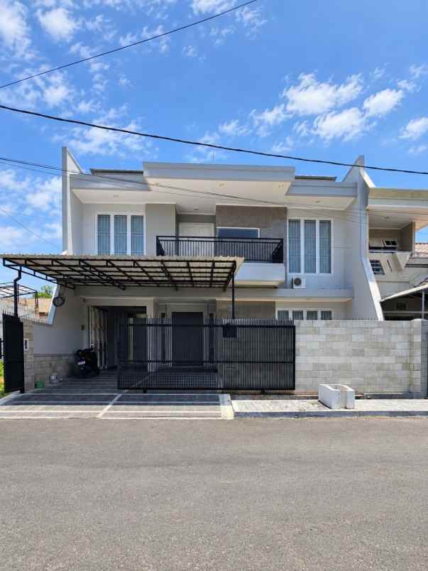 dijual rumah dharmahusada indah