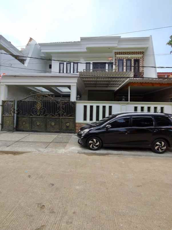 dijual rumah duren sawit