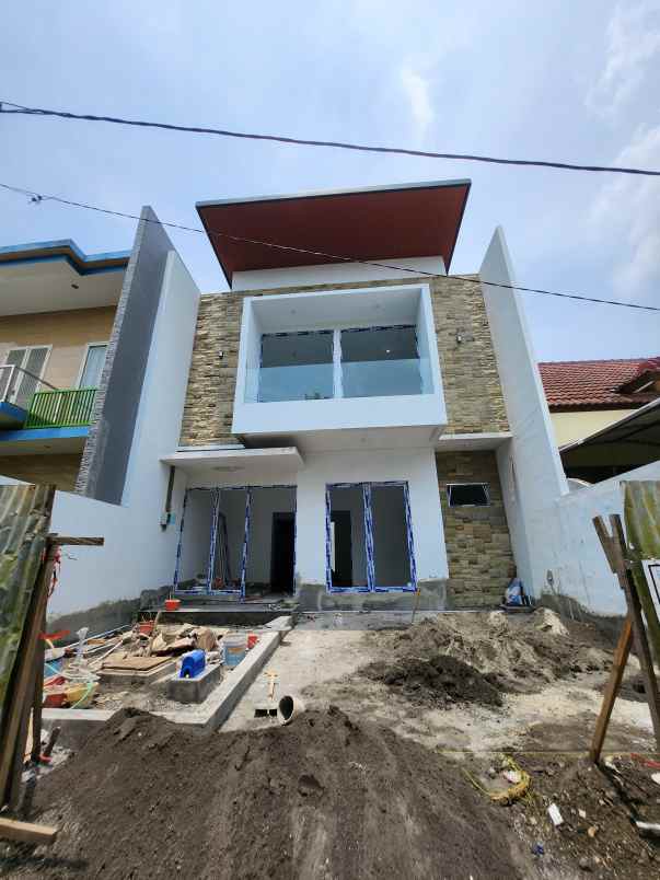 dijual rumah jalan bukit palma