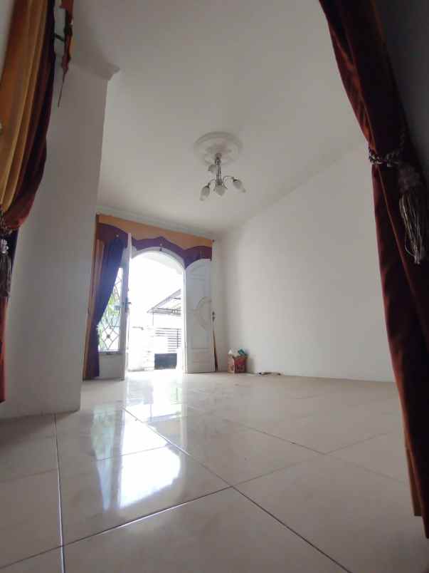 dijual rumah jl bukit barisan