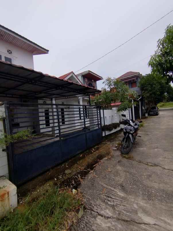 dijual rumah jl bukit barisan