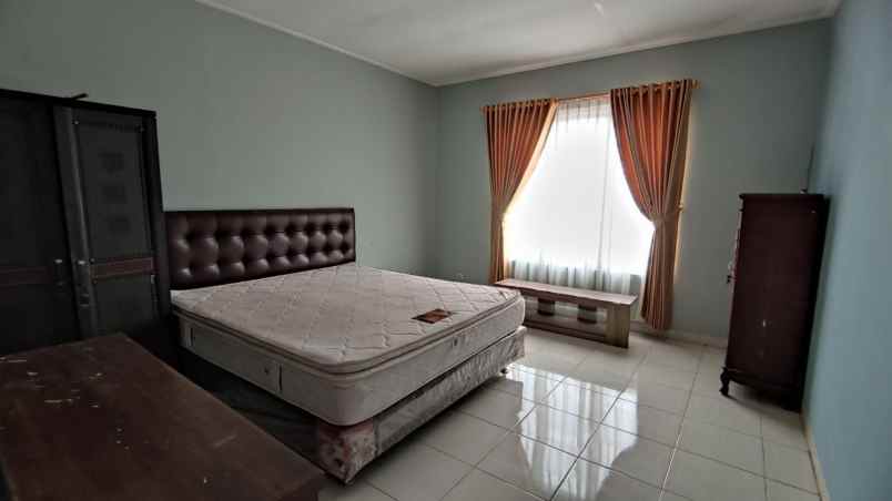 dijual rumah jl raya jatiwarna