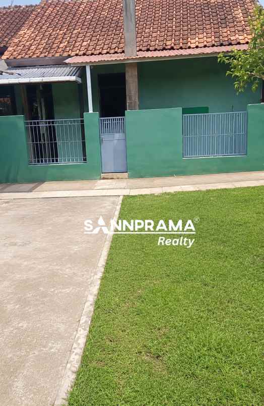 dijual rumah jln raya pondok cabe