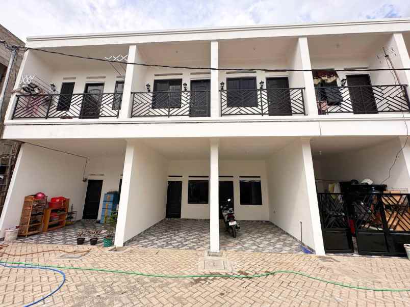 dijual rumah kampung tengah