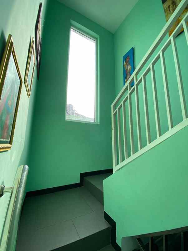 dijual rumah springhills sawojajar