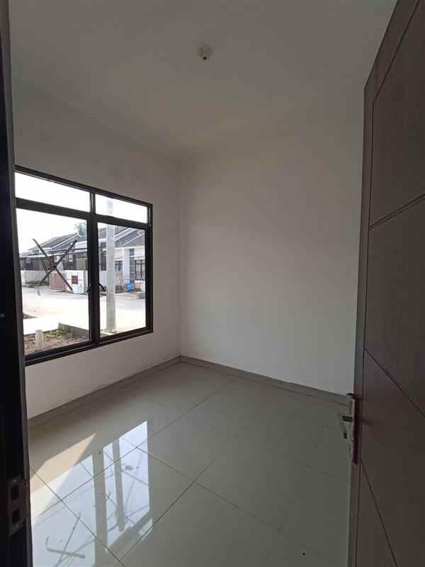 dijual rumah taman sari setu