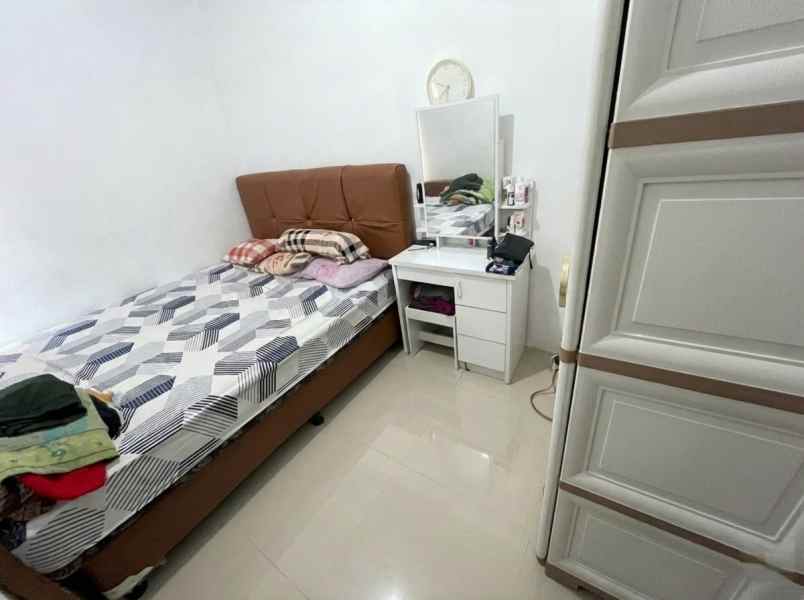 over kredit rumah grand sutera serang