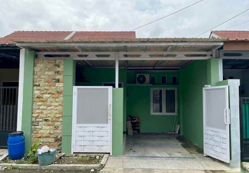 over kredit rumah grand sutera serang