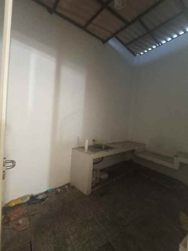 ruko 4 lantai dharmahusada parkir luas minim 2 tahun