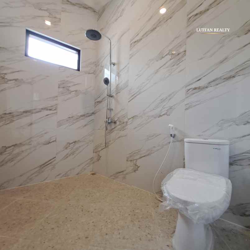 rumah american non cluster dekat tol andara