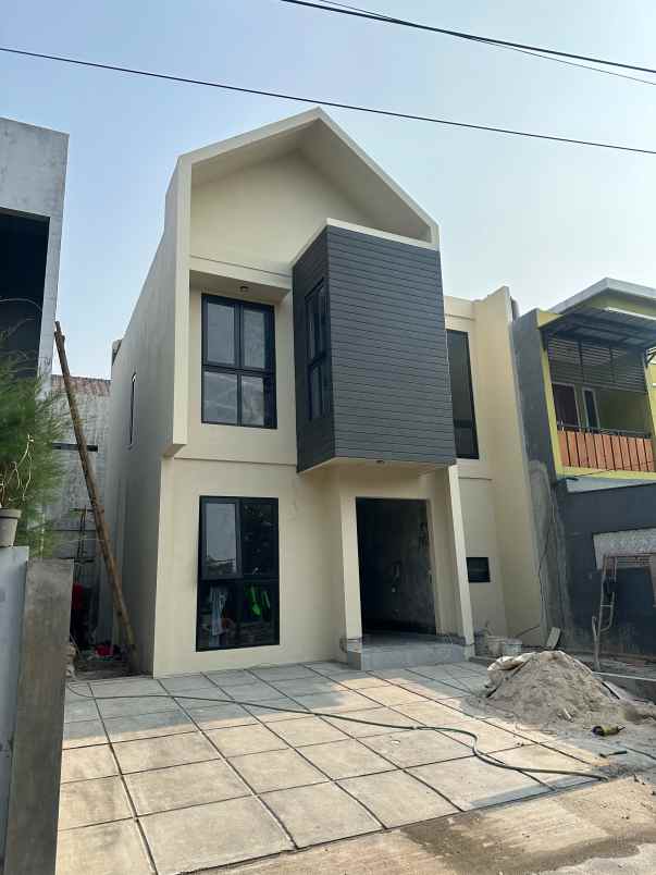 rumah baru 2 lantai di puri bintara dekat pondok kopi